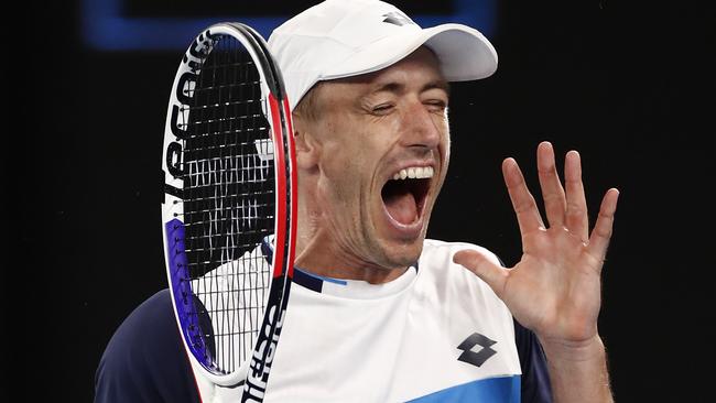 John Millman of Australia reacts during his third round match against Roger Federer.