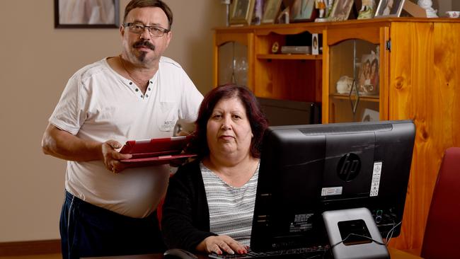 Anna Nuzzo with her husband Peter face a long wait for NBN connection. Photo: Naomi Jellicoe