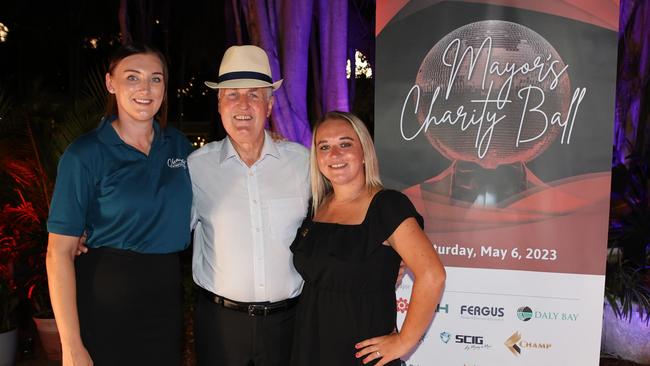 Mayor Greg Williamson, sporting a Fedora hat, at last nightâ&#128;&#153;s launch with representatives of 2023 Mayorâ&#128;&#153;s Ball charity recipients Samantha Lee (right), of Ronald McDonald House, and Kayleigh Brewster (left), of Mackayâ&#128;&#153;s Australian Street Aid Project. Photo: Contributed