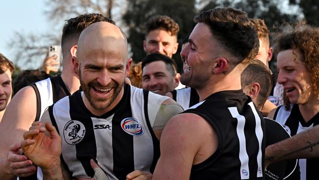 Parkside players congratulate best on ground Shaun Campbell. Picture: Andy Brownbill