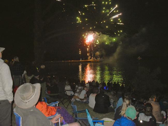 Carol-goers enjoying the impressive fireworks display at the Phillip Island Christmas Carols by the Bay at the Cowes Foreshore on Tuesday, December 10, 2024. Picture: Jack Colantuono