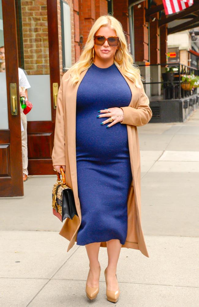 Simpson cradling her bump during a walk in Soho, NYC in September 2018. Picture: Raymond Hall/GC Images