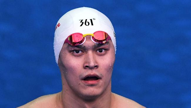 (FILES) In this file photo taken on July 22, 2019 China's Sun Yang reacts after competing in a heat for the men's 200m freestyle event during the swimming competition at the 2019 World Championships at Nambu University Municipal Aquatics Center in Gwangju, South Korea. - China's triple Olympic swimming gold medallist Sun Yang has been found guilty of refusing to give a doping sample and banned for eight years in an eagerly-awaited judgement from the Court of Arbitration for Sport (CAS) on February 28, 2020. (Photo by Ed JONES / AFP)