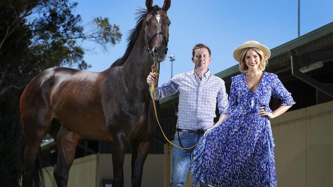 Model Olivia Rogers with Balf's Choice and trainer Ryan Balfour at Morphettville last year. Picture: Sarah Reed