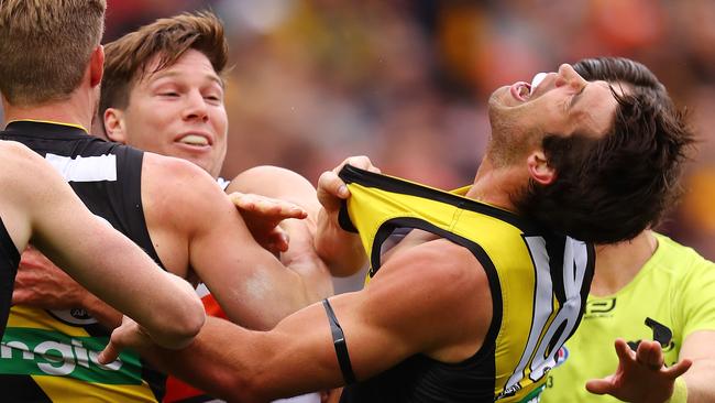 Richmond vs. GWS Giants at the MCG. GWS Giants Toby Greene gives Richmond's Alex Rance a jumper punch 1st qtr. Pic: Michael Klein