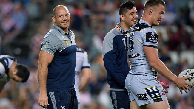 Matt Scott of the Cowboys, (centre), looks on as his team warms up ahead of the NRL Preliminary Final between the Sydney Roosters and the North Queensland Cowboys at Allianz Stadium.