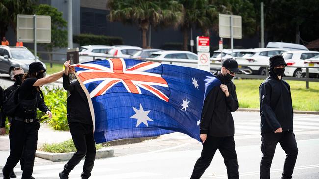 Members of the National Socialist Network were stopped by police at North Sydney on Australia Day.