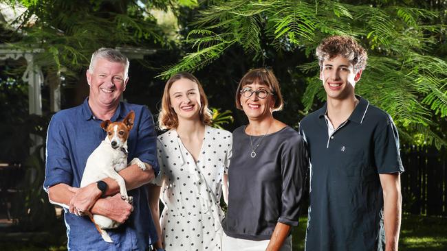 Pat Condren, holding Jackie the dog, with his wife Margaret Little and children Maddy, 20, and Fin, 17. Picture: Nigel Hallett