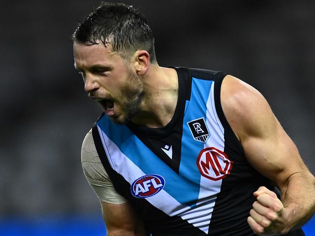 MELBOURNE, AUSTRALIA - AUGUST 20: Travis Boak of the Power celebrates kicking a goal during the round 23 AFL match between Western Bulldogs and Port Adelaide Power at Marvel Stadium on August 20, 2021 in Melbourne, Australia. (Photo by Quinn Rooney/Getty Images)