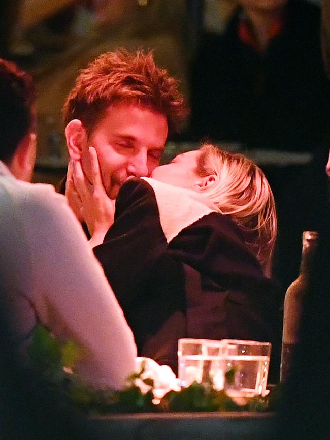 They packed on the PDA during a dinner with friends. Picture: TheImageDirect.com