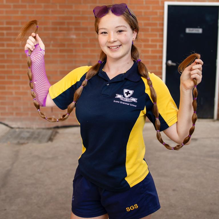 14-year-old Elsie Kennedy from Scone Grammar School chopped her long Rapunzel locks to donate her hair to Wigs 4 Kids – a program run by Kids with Cancer Foundation. Picture: supplied