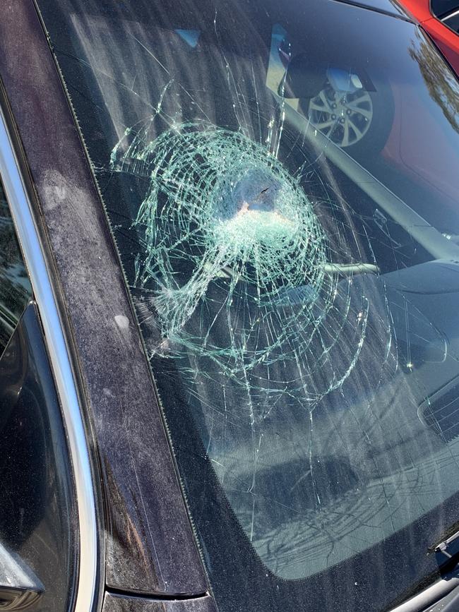 A smashed window. Picture: Jay Town