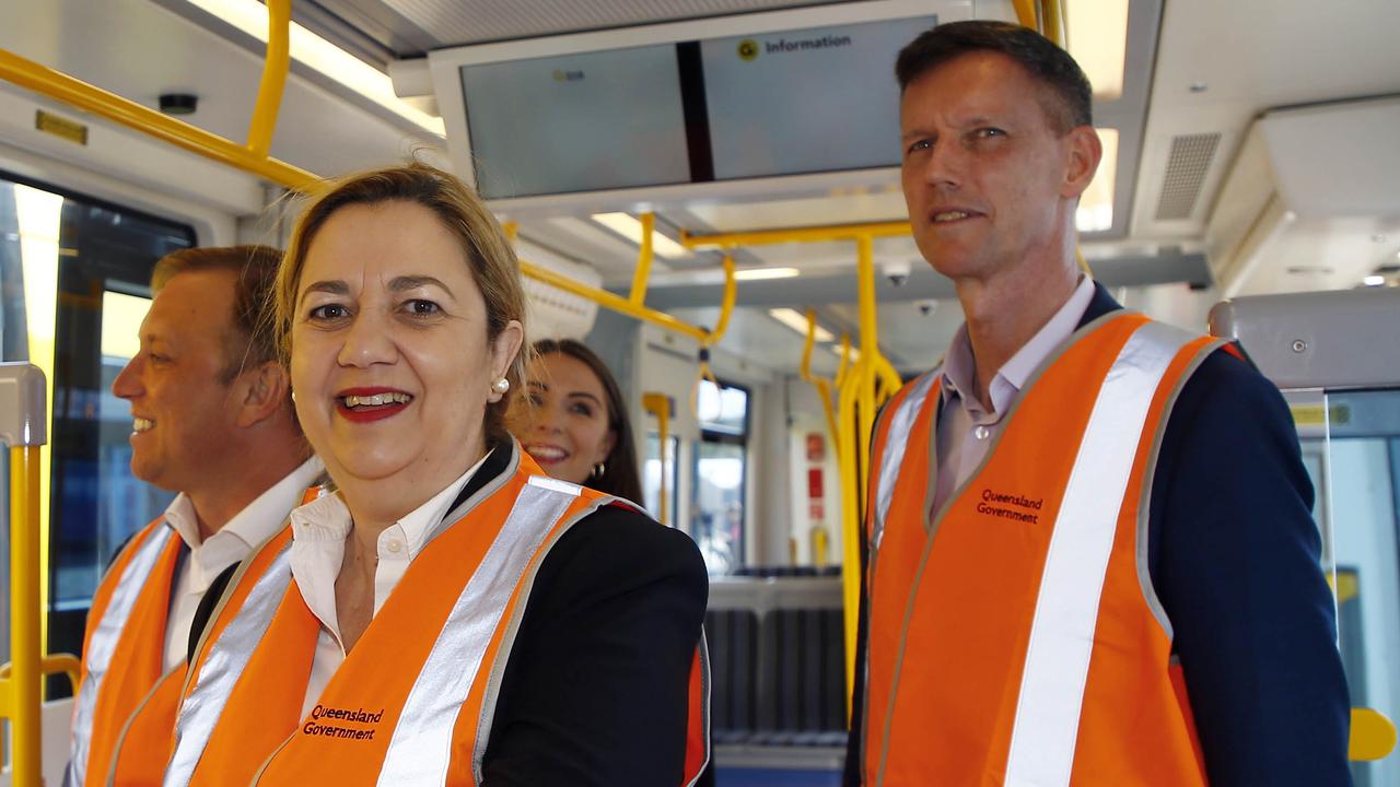 Premier Annastacia Palaszczuk (front) and Transport Minister Mark Bailey (right) inspect a new Gold Coast tram recently. Picture: Tertius Pickard/NCA NewsWire