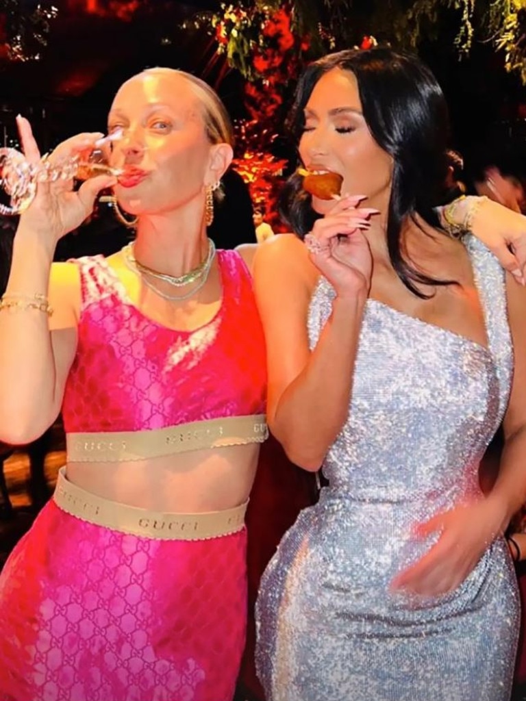 Kim and a friend enjoy the food and drinks. Picture: Instagram