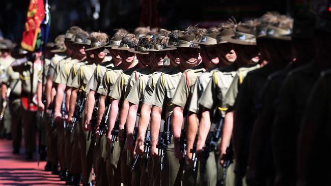 Defence forces veterans and active servicemen and women take part in an ANZAC Day march. Picture: AAP Image/Dan Peled