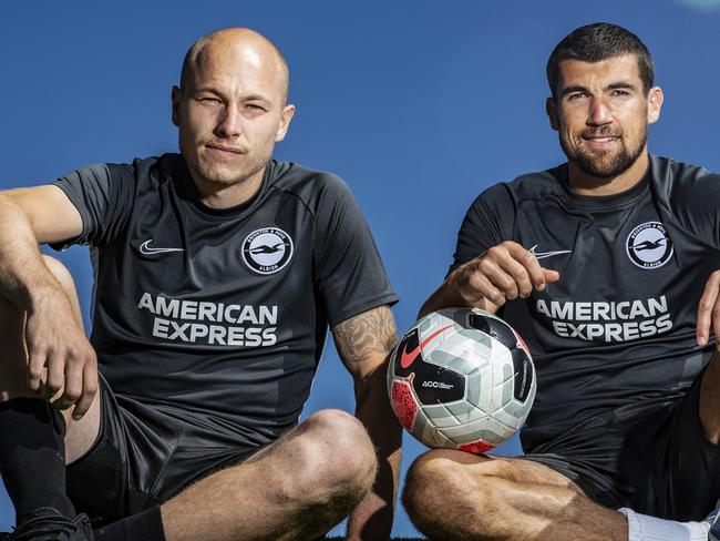 EMBARGOED FOR SUNDAY 7TH OF SEPTEMBER PAPERSEXCLUSIVE NEWS360 PREMIUM LOCKED CONTENTNO NEWS.COM, NO SKY, NO WEST AUSTRALIAN, NO AUSTRALIAN 29/08/2019: (L-R) Aaron Mooy and Mathew Ryan are both Australian football players in the national team. This is the first year they are playing together in the Premier League. Aaron is a midfielder and Mat is a goal keeper. He's following in Mark Schwarzer's footsteps of being an Aussie goal keeper in the Premier League. Photographed at Brighton & Hove Albion New Training Ground, United Kingdom on Thursday. Hollie Adams for News Corp Australia