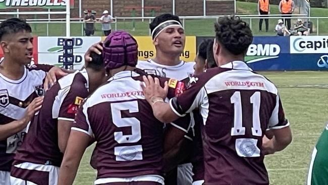 Burleigh Bears Arama Hau, head tapped, is a young gun from Keebra Park SHS.