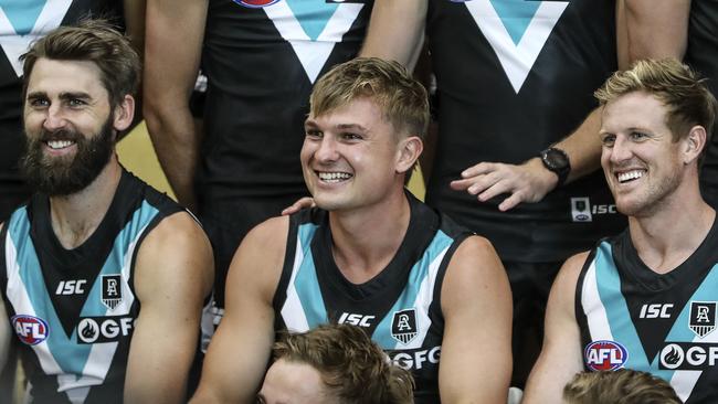 Justin Westhoff, left, with teammate Ollie Wines and captain Tom Jonas at team photo day at the beginning of the 2020 season. Picture: Sarah Reed