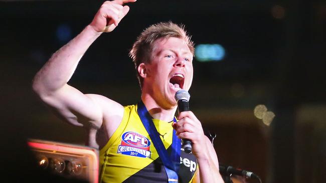 Jack Riewoldt sings with The Killers after the 2017 Grand Final. Picture: Scott Barbour/AFL Media/Getty Images.