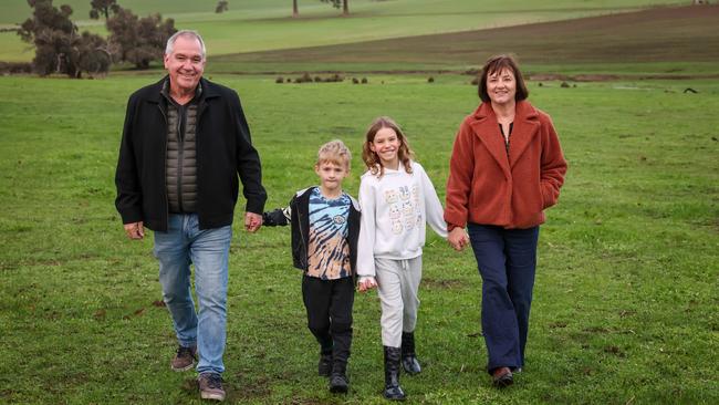 Rob and Kate on Kate and husband Phil’s Boyup Brook farm with grandchildren Milo, 6, and Willow, 9. Picture: Colin Murty