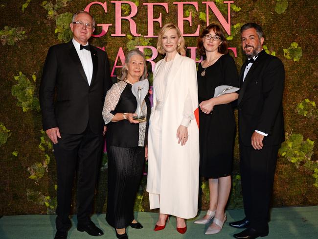 Cate Blanchett, centre, poses with Australian woolgrowers Richard Weatherly, Jenny Weatherly, Vanessa Dunbabin and Matt Dunbabin, winners of the Eco Stewardship Award, at The Green Carpet Fashion Awards Italia 2018 at Teatro Alla Scala in Milan, Italy. Picture: DAVE BENETT