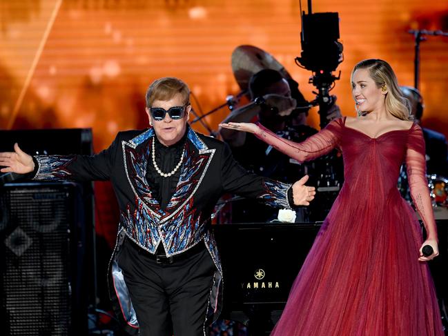 Sir Elton John and Miley Cyrus perform onstage during the 60th Annual GRAMMY Awards at Madison Square Garden on January 28, 2018 in New York City. Picture: Getty