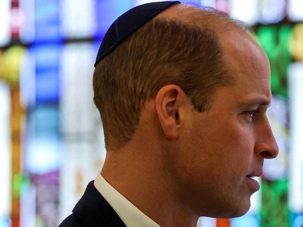 Prince William, Prince of Wales wears a kippah during a visit to the Western Marble Arch Synagogue, in London, on February 29, 2024. (Photo by Toby Melville / POOL / AFP)