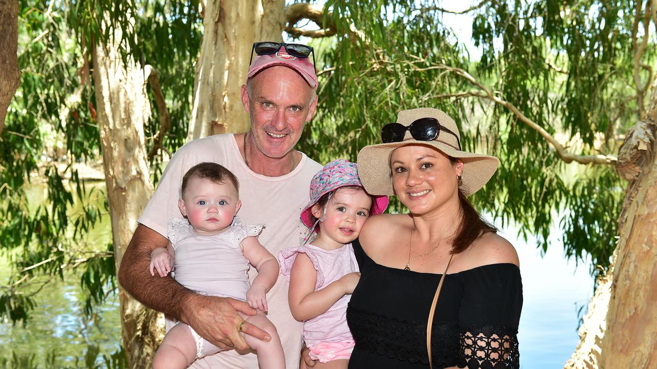 Lynne and John McConkey with daughters Calista, 5mths and Estella, 2, pictured at Billabong Sanctuary. Picture: Shae Beplate.