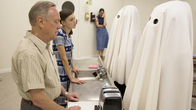 The two audience members, dressed as ghosts, can watch the play just centimetres away from the actors. but they need to rotate around to see the other scenes. Picture: Joshua Heath