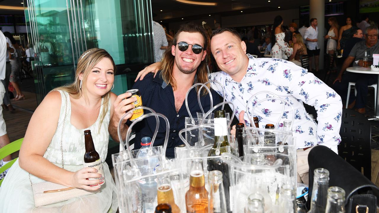 Shelly Youngs, Wayne Kneff and Blake Pascoe enjoy the 2020 Great Northern Darwin Cup Carnival. Picture: Katrina Bridgeford.