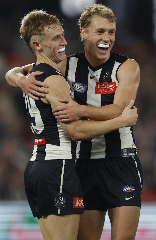 Finlay Macrae of the Magpies celebrates a second quarter goal with Joe Richards. Picture: Michael Klein