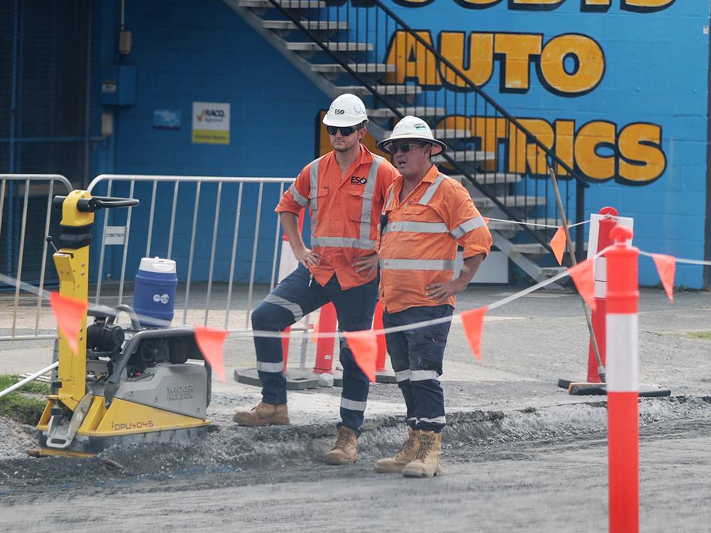 Workers on the Gold Coast light rail extension on Tuesday.