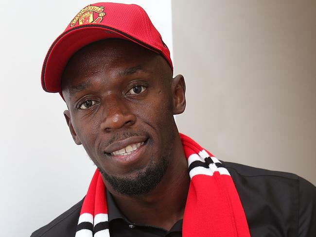 MANCHESTER, ENGLAND - AUGUST 26:  Sprinter Usain Bolt poses at halftime during the Premier League match between Manchester United and Leicester City at Old Trafford on August 26, 2017 in Manchester, England.  (Photo by John Peters/Man Utd via Getty Images)