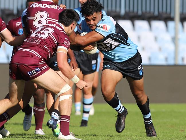 Cronulla Shakrs SG Ball Cup forward Salesi Ataata taking a hit up against the Manly Sea Eagles. Picture: Sharks Media