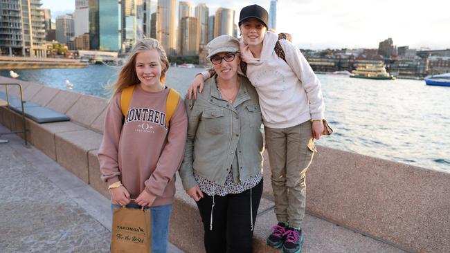 Lisa Vowles and her daughters Matilda and Darcy Henning, came to Sydney on a holiday despite Covid restrictions. Picture: Ryan Osland