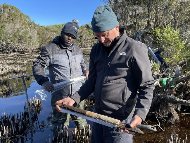 Researchers studying coring at Emerald Swamp as part of ANU study on fire management. Picture: Professor Simon Haberle