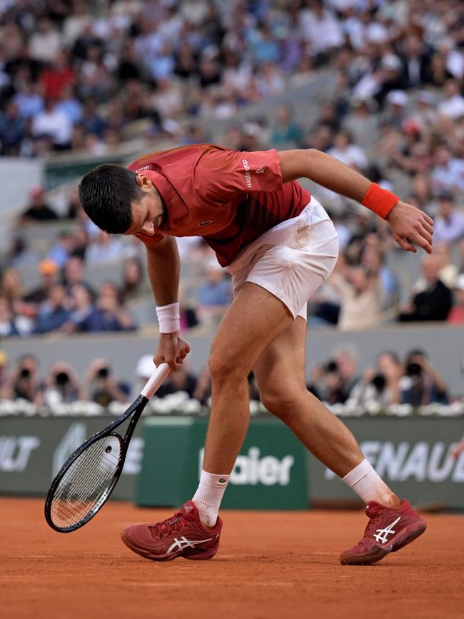 Djokovic was in a bad way. Photo by Bertrand GUAY / AFP