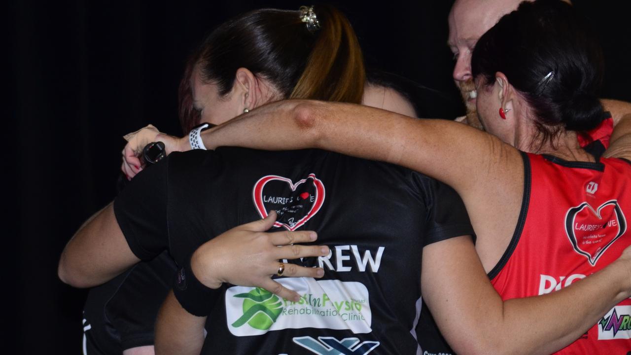 Laurie's Love Row for a Cure organisers embrace after announcing the event raised $134,000 for Laurie's Love.