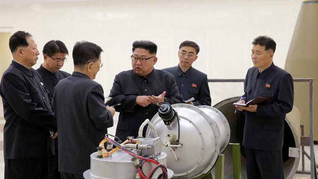 Kim Jung-un with what was said to be a hydrogen bomb.