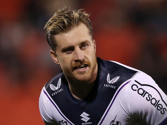 PENRITH, AUSTRALIA - AUGUST 11: Cameron Munster of the Storm warms up before the round 22 NRL match between the Penrith Panthers and the Melbourne Storm at BlueBet Stadium on August 11, 2022, in Penrith, Australia. (Photo by Cameron Spencer/Getty Images)