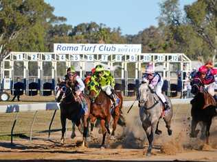 TIGHT FINISH: Two Amor and jockey Shannyn Barlow take to the lead in the final race of the Cities' race day 2018. Picture: Molly Hancock