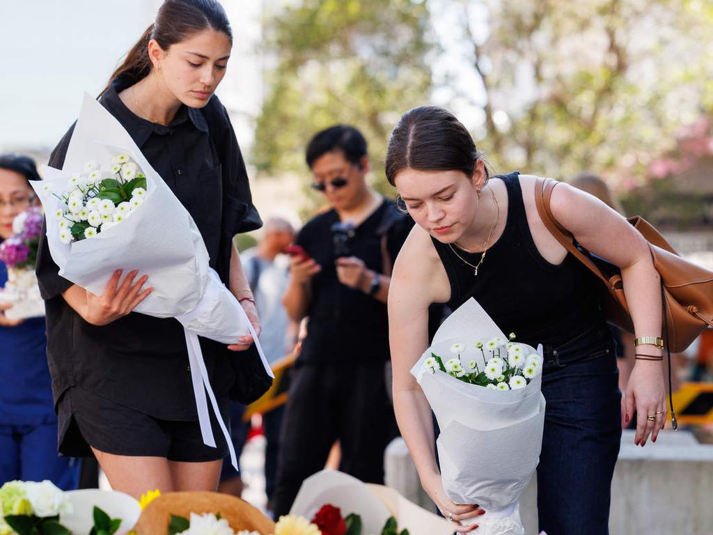 Floral tributes are laid at Bondi Junction following Saturday’s massacre. Picture: NCA NewsWire / David Swift