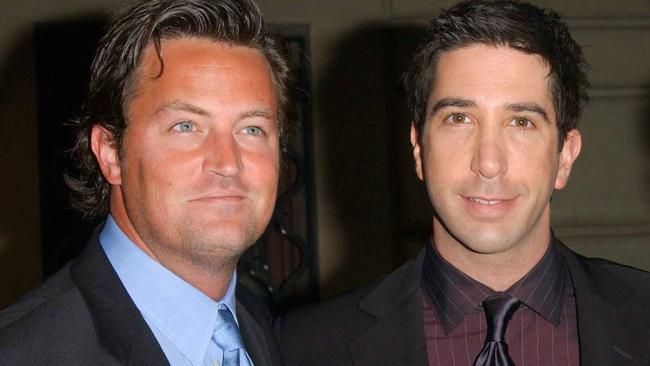 (FILES) Actors Matthey Perry (L), David Schwimmer (C) and Matt Leblanc (R) attend the 28th Annual People's Choice Awards in Pasadena on January 12, 2002. Matthew Perry, one of the stars of smash hit TV sitcom "Friends," has been found dead at his home, US media reported Saturday October 28. He was 54. Law enforcement sources told the Los Angeles Times that Perry was found unresponsive in a hot tub at his Los Angeles home. The LA Times and TMZ, which first reported the news, both said there were no signs of foul play, citing anonymous sources. (Photo by Chris Delmas / AFP)