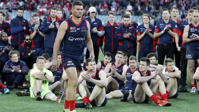 Redleg Mitch Grigg walks up to accept the Jack Oatey Medal for the best player in the SANFL grand final. Picture Sarah Reed