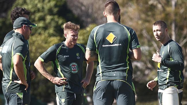 Michael Clarke (R) with his Australia teammates at the National Cricket Centre in Brisbane.