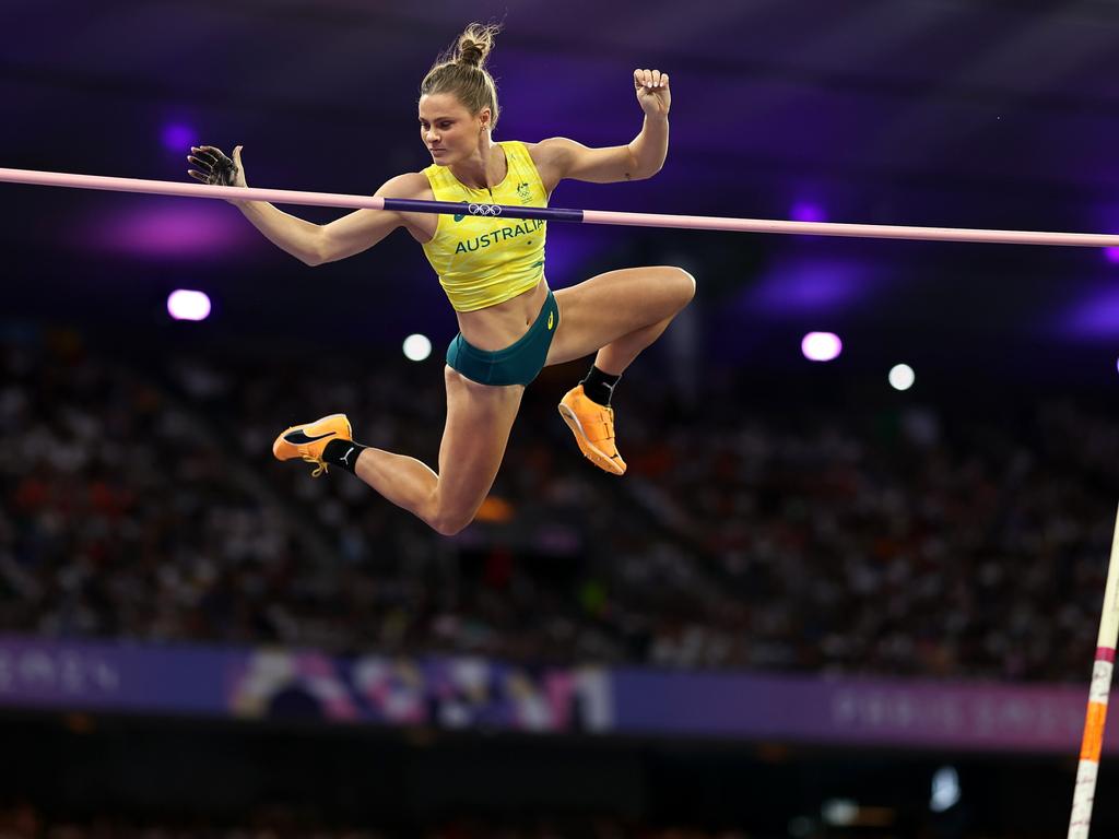 Over she goes: Kennedy was the first and only competitor to clear 4.90m in the final. Picture: Cameron Spencer/Getty Images