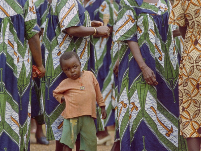 A child stands close to his mum in Yokodouma, Cameroon. Picture: Stephen van der Mark