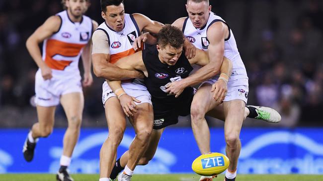 Patrick Cripps cops a hammering against the Giants.