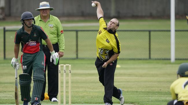 Mark Carroll bowling for Seaford Tigers. Picture: Valeriu Campan