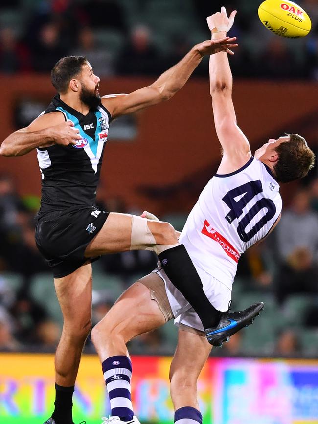 Port Adelaide ruckman Paddy Ryder, pictured contesting the ruck against Docker Scott Jones, wants to join Dougal Howard at St Kilda. Picture: MARK BRAKE (Getty Images).